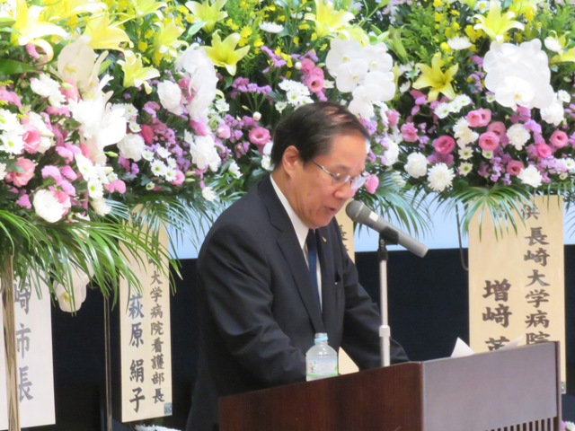 原爆復興70周年記念講話を語る朝長氏